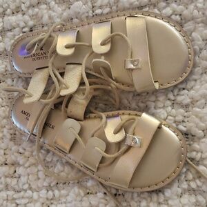 American eagle gladiator gold sandals